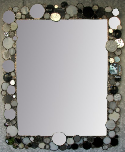 Espejo artesanal Eskulan utilizado como muestra